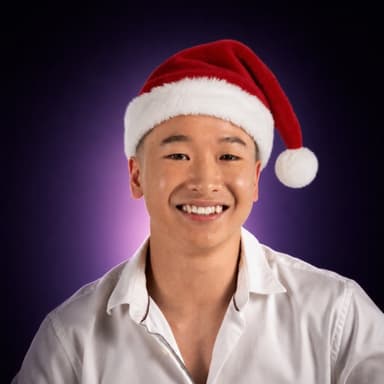 Benjamin Chua wearing a Santa hat